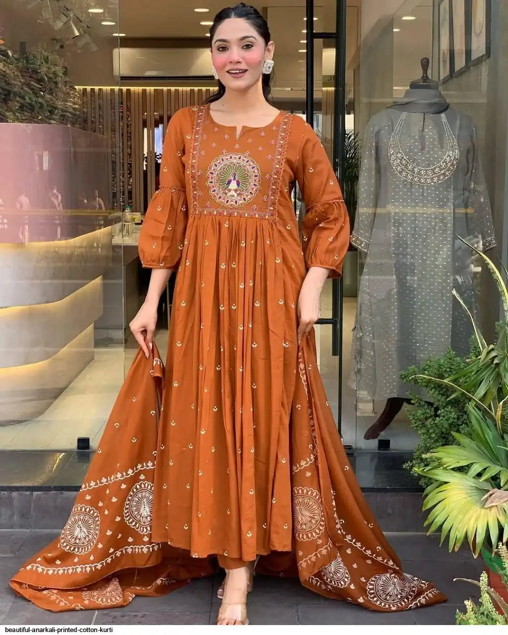 Latest And Trending Peacock Cotton Printed Anarkali And Pant With Dupatta Set ( Orange )