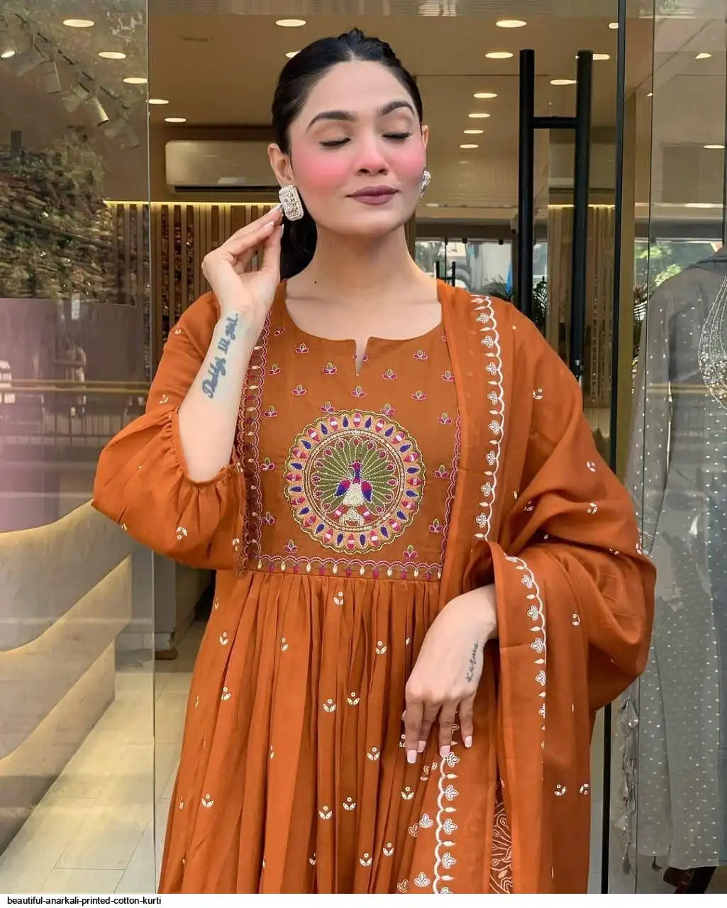 Latest And Trending Peacock Cotton Printed Anarkali And Pant With Dupatta Set ( Orange )