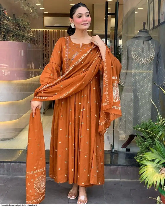 Latest And Trending Peacock Cotton Printed Anarkali And Pant With Dupatta Set ( Orange )